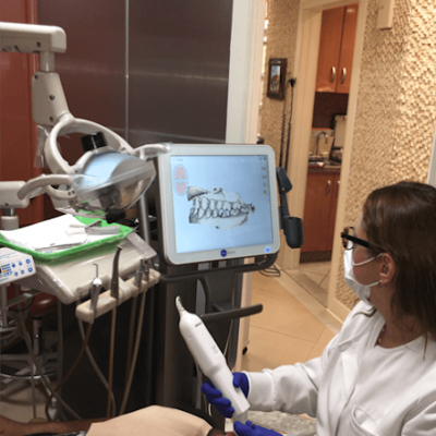 Doctor examine patient - Contemporary & Esthetic Dentistry