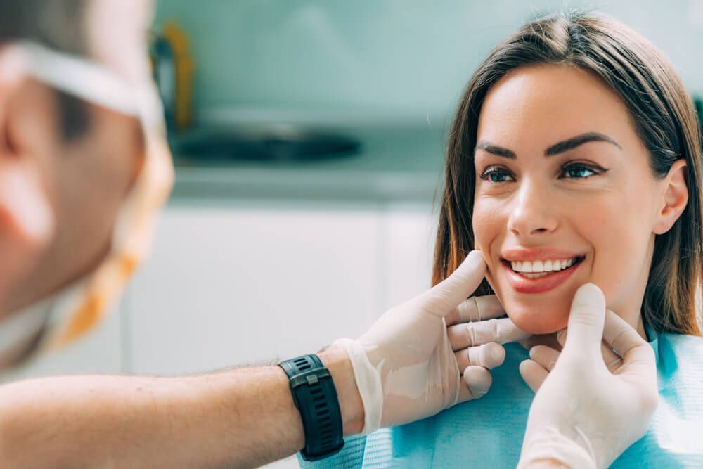 Young smiling woman with beautifiul teeth