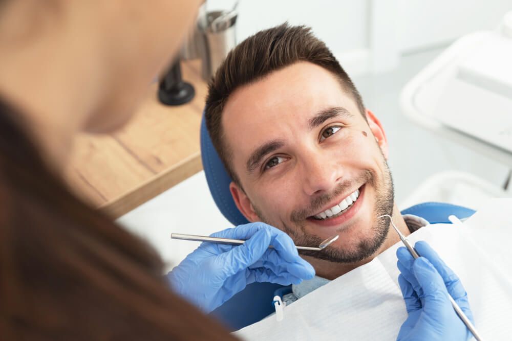 Man having a visit at the dentist's