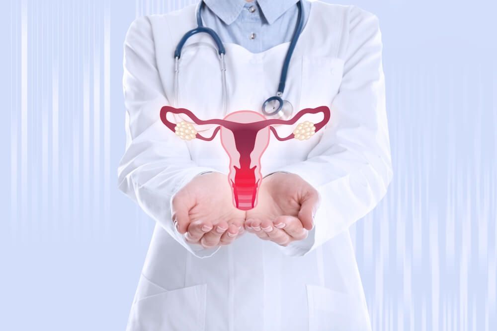 Doctor demonstrating virtual image of inflamed female reproductive system
