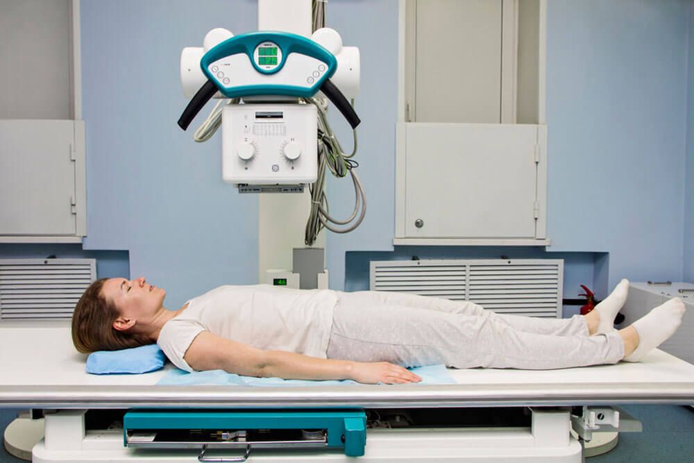 X-ray machine scan patient in medical hospital