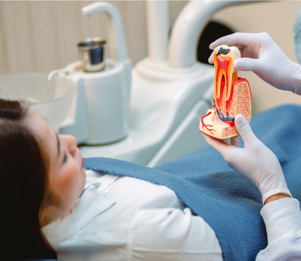 Dentist examining teeth patients in clinic