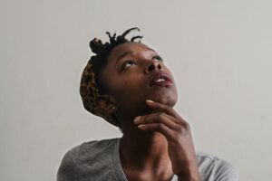 African American woman looking upwards