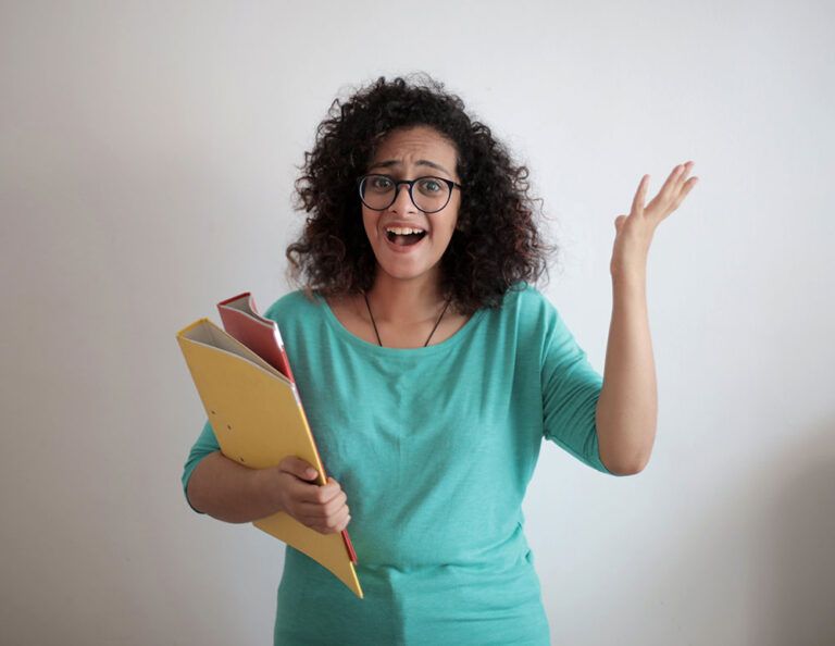 Woman with glasses surprised