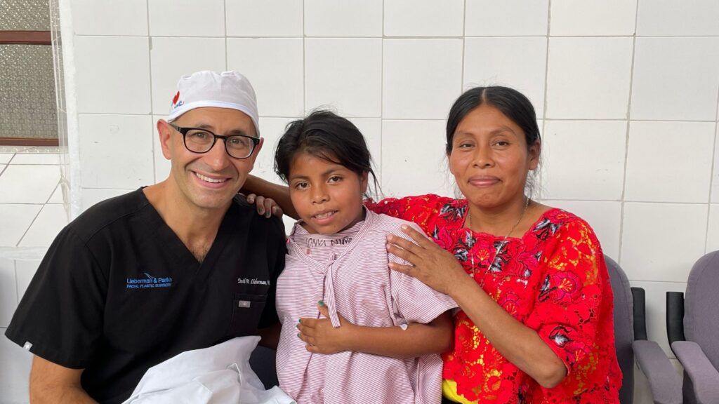 Dr. Lieberman with a patient and a mother
