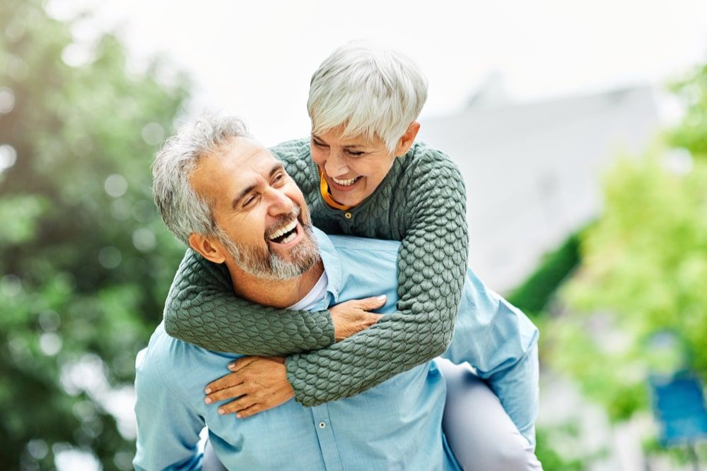 Happy active senior couple outdoors