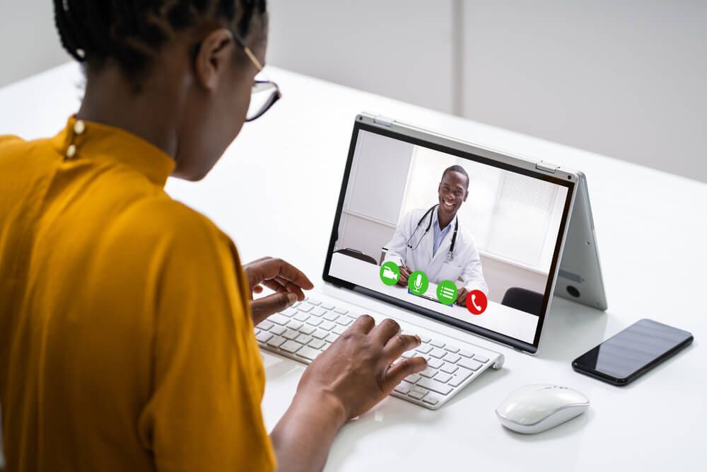 Video Chat Or Conference With Doctor On Laptop