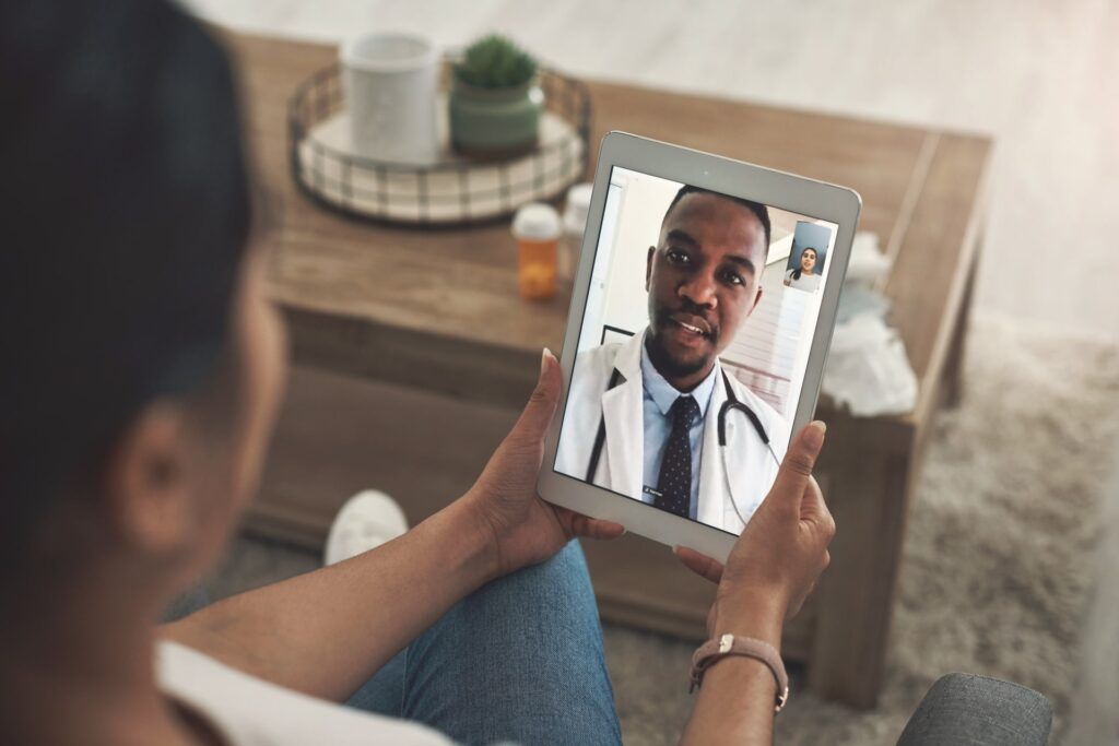 Patient consulting with a doctor online from home