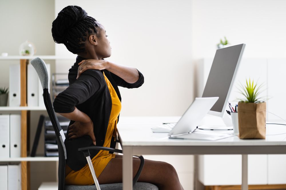 Back Pain Bad Posture Woman Sitting In Office