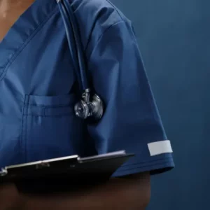 Close up of doctor with clipboard