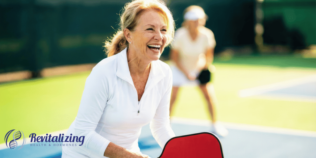 Healthy, confident woman in her 50s representing menopause, hormone therapy, hormone optimization, and healthy aging at Revitalizing Health & Hormones in Altoona, WI and Eau Claire, WI.