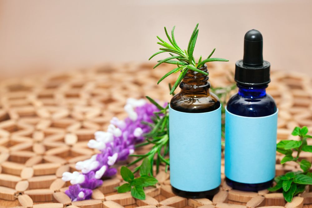 Naturopathic medicine showing a holistic approach using natural plants and herbs in glass bottles
