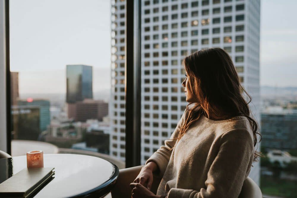 Young woman at restaurant on 35 floor