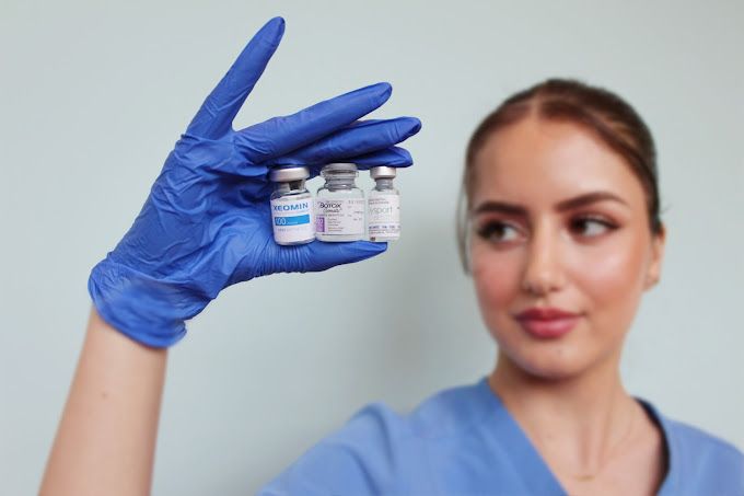 Nurse holding Wrinkle Reducer products