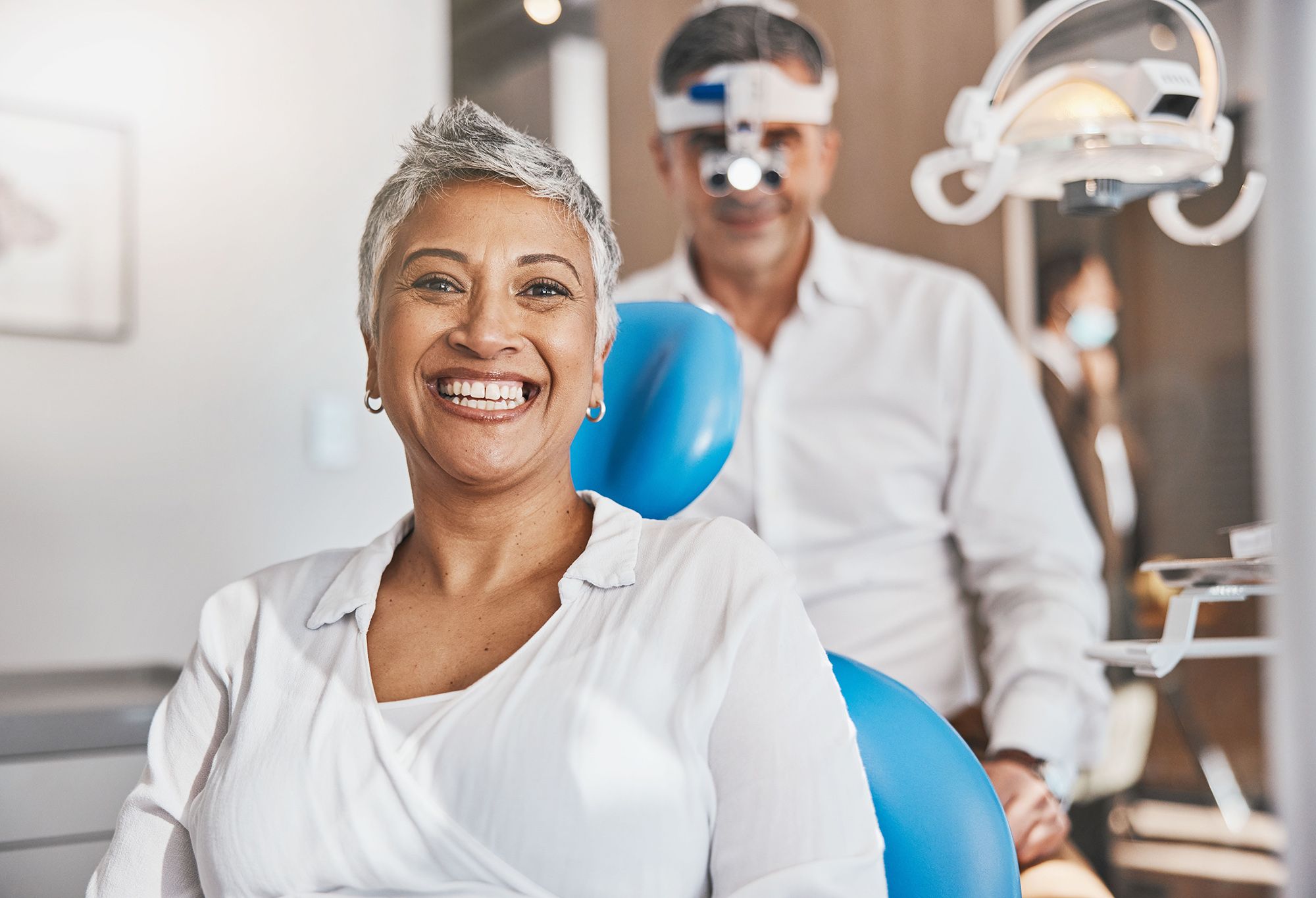 happy and dental with a woman patient in a doctor