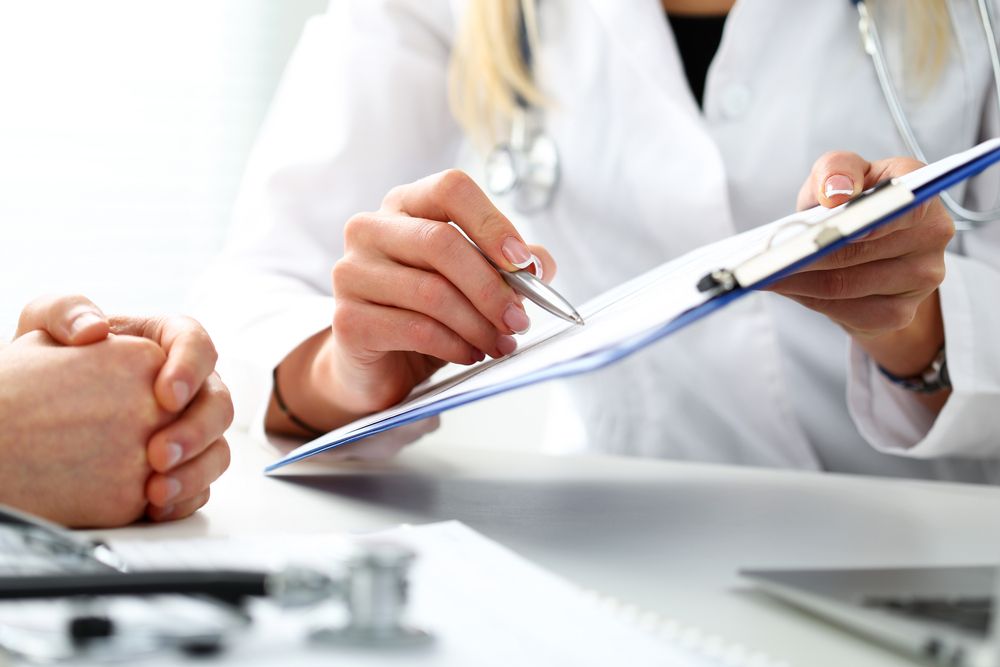 Female,Doctor,Hand,Hold,Silver,Pen,Filling,Patient,History,List