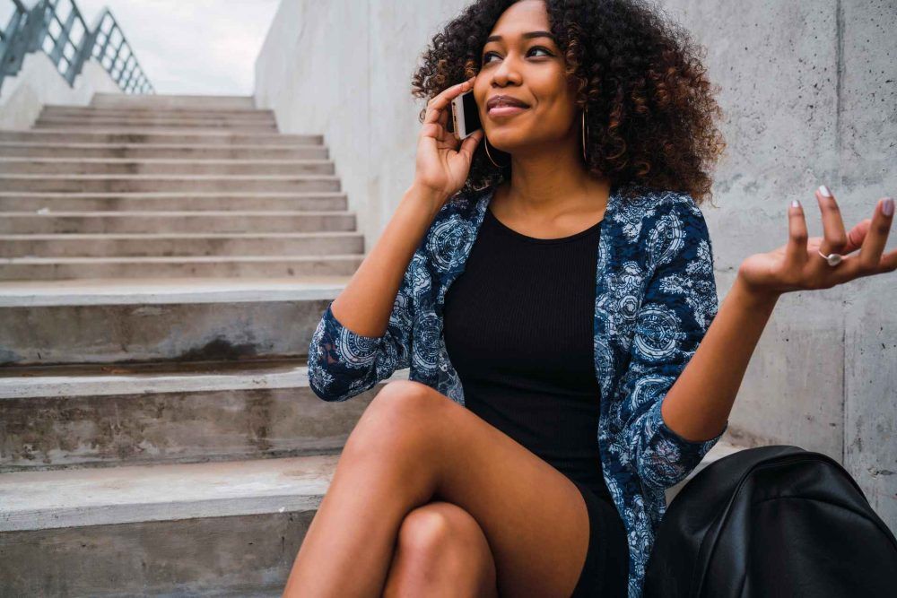 young beautiful woman talking on the phone