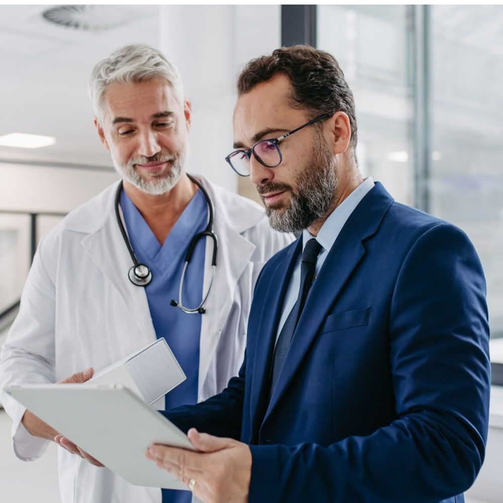 patient talking with doctor in medical building