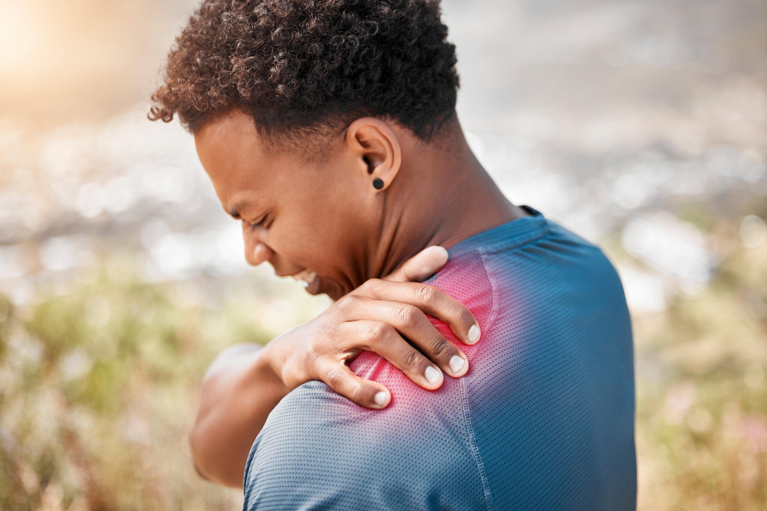 shoulder pain and injury with a sports man