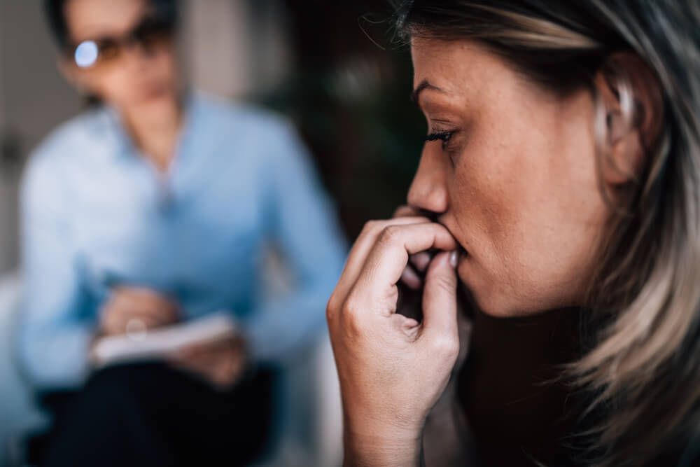 Woman with Anxiety Disorder, Biting Fingernails