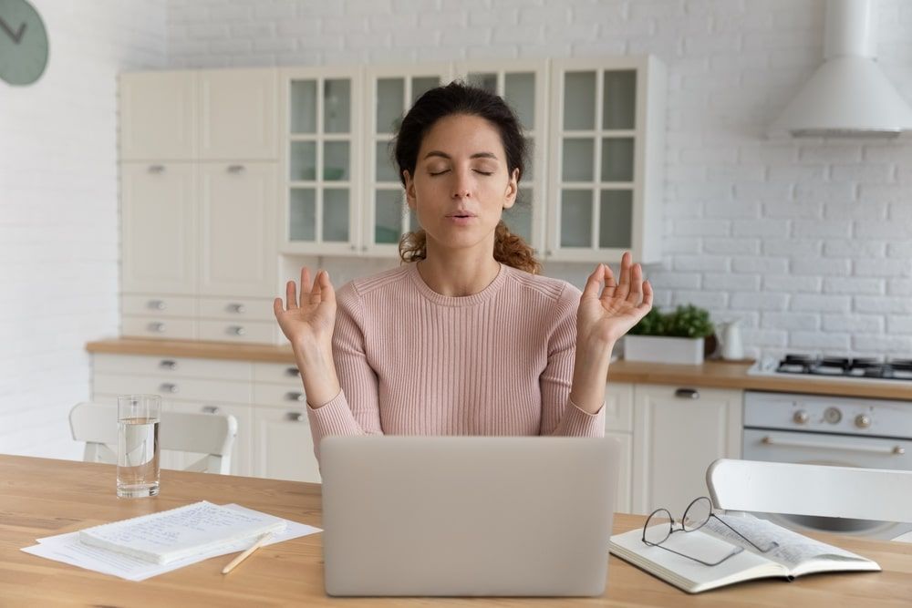 Woman Taking Deep Breaths