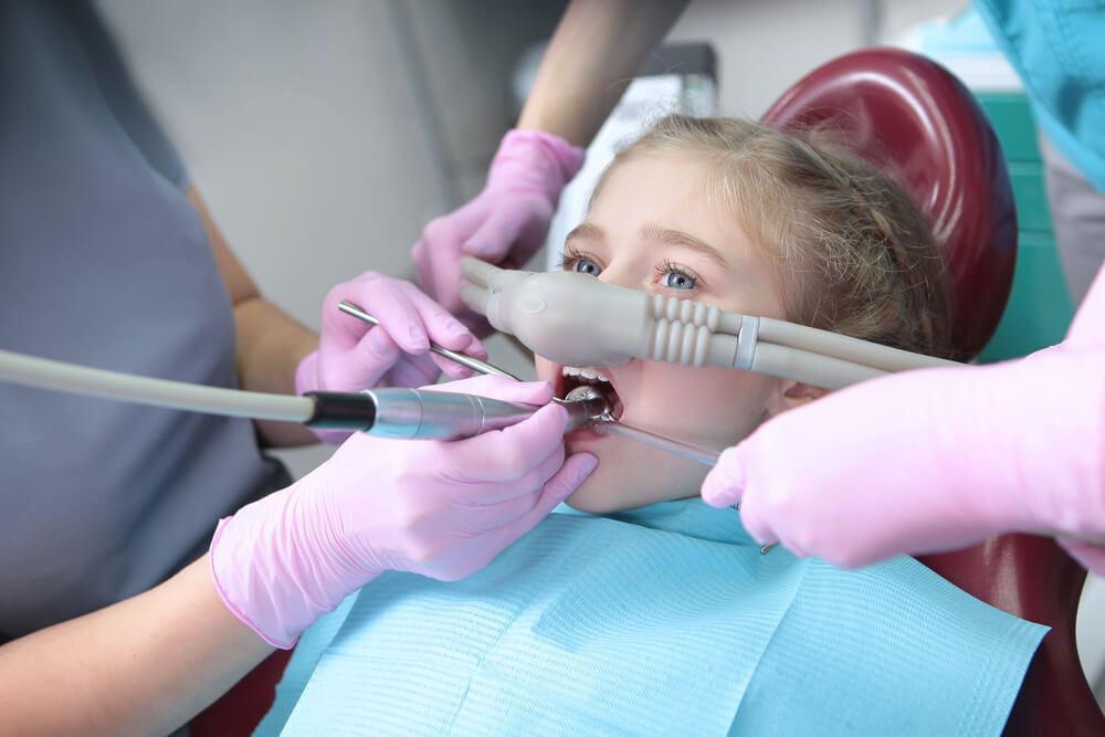 Dental treatment in a child with the use of nitrous oxide