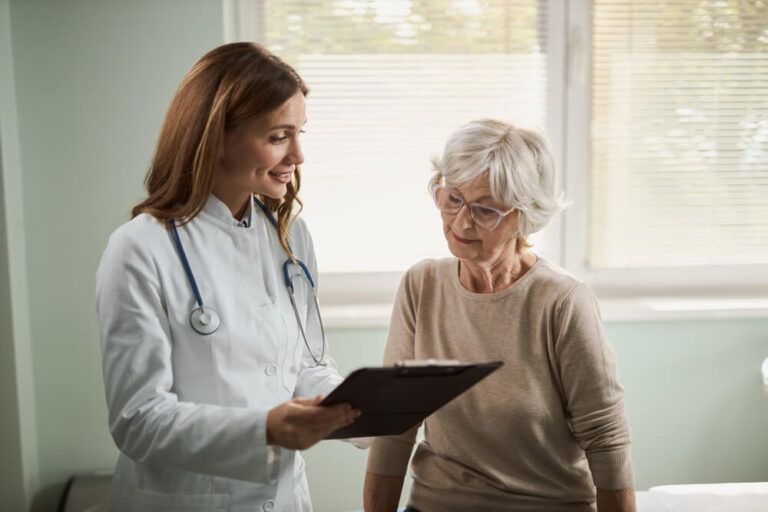 physician talking to patient about chronic disease management
