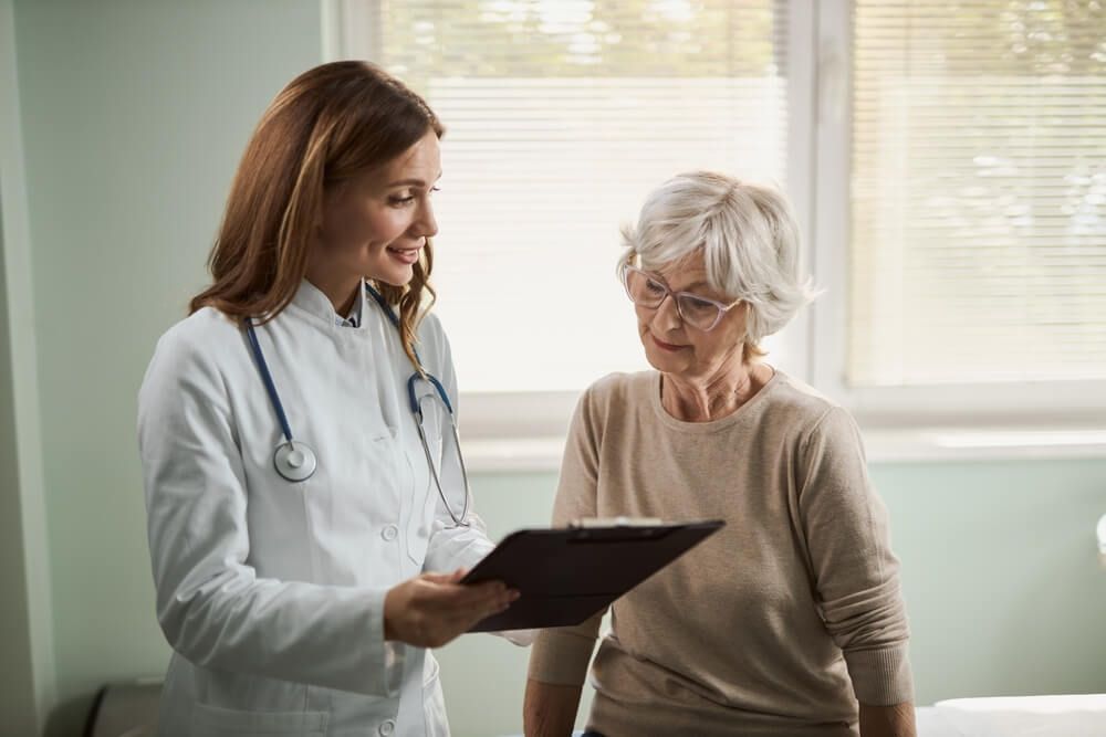 physician talking to patient about chronic disease management