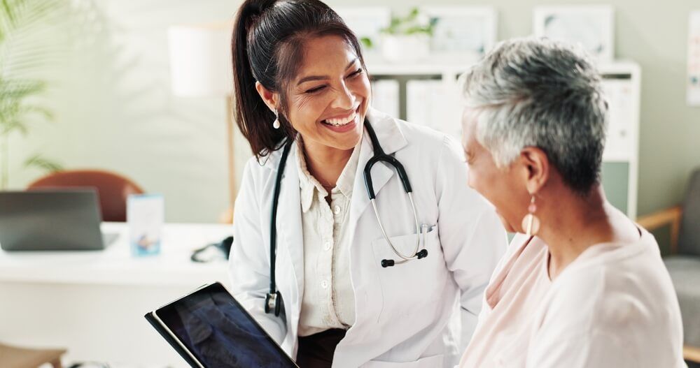 doctor with patient discussing hormonal disorder management