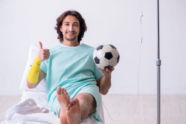 Young man staying in hospital in transfusion concept