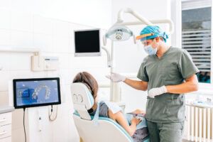 Dentist with female patient in a modern dental clinic explaining the procedure