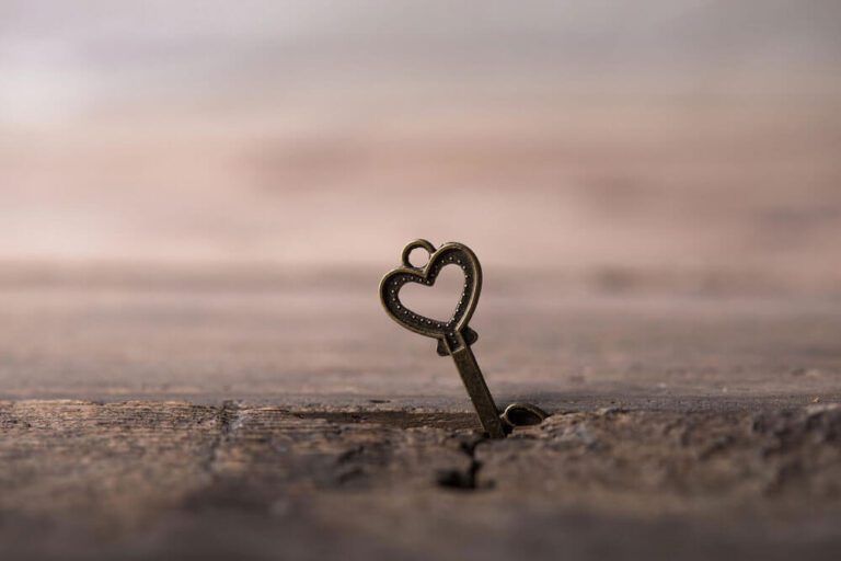 Heart shaped key in mud