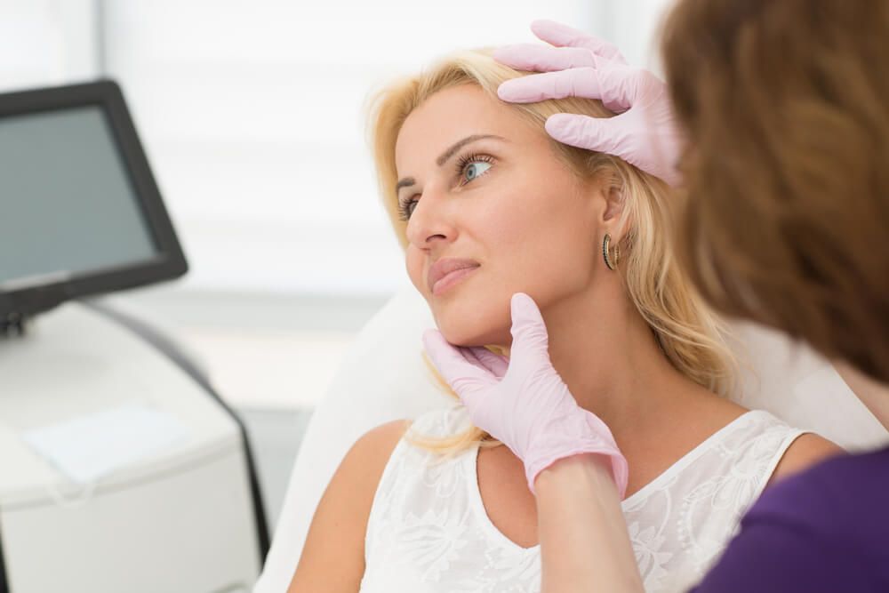 Attractive woman during appointment with doctor