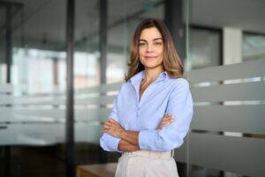 Confident smiling middle aged business woman attorney
