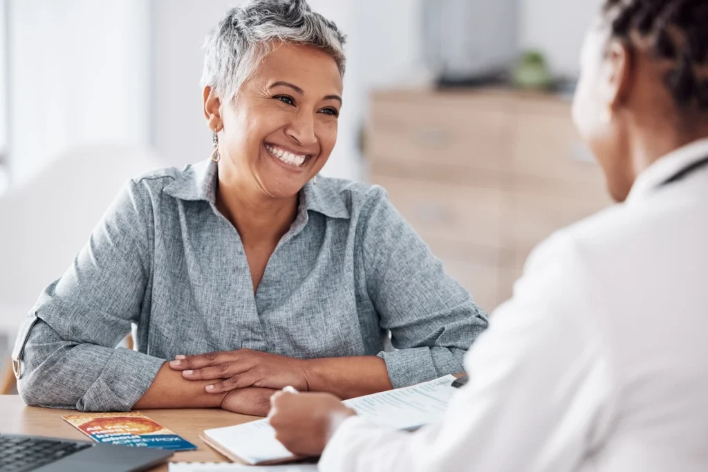 Patient speaking with provider during a long-form, personalized consultation at Grace Direct Primary Care in Prescott.
