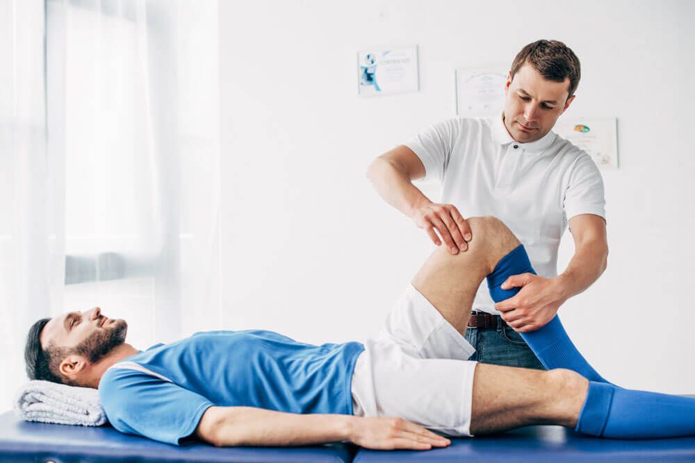 physio working on young patient