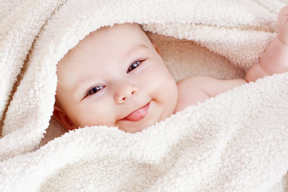 baby with towel