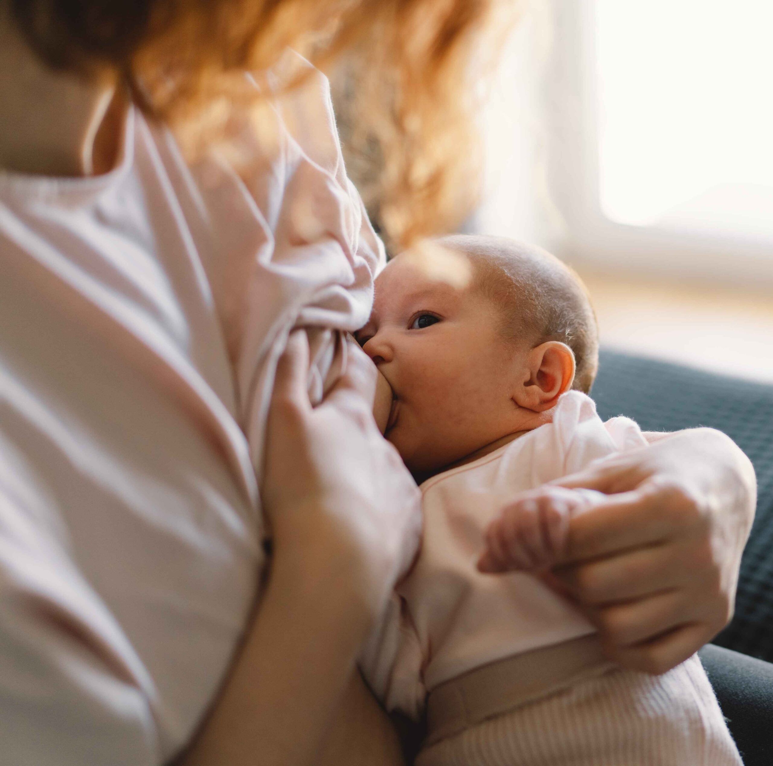 mom and breastfeeding baby