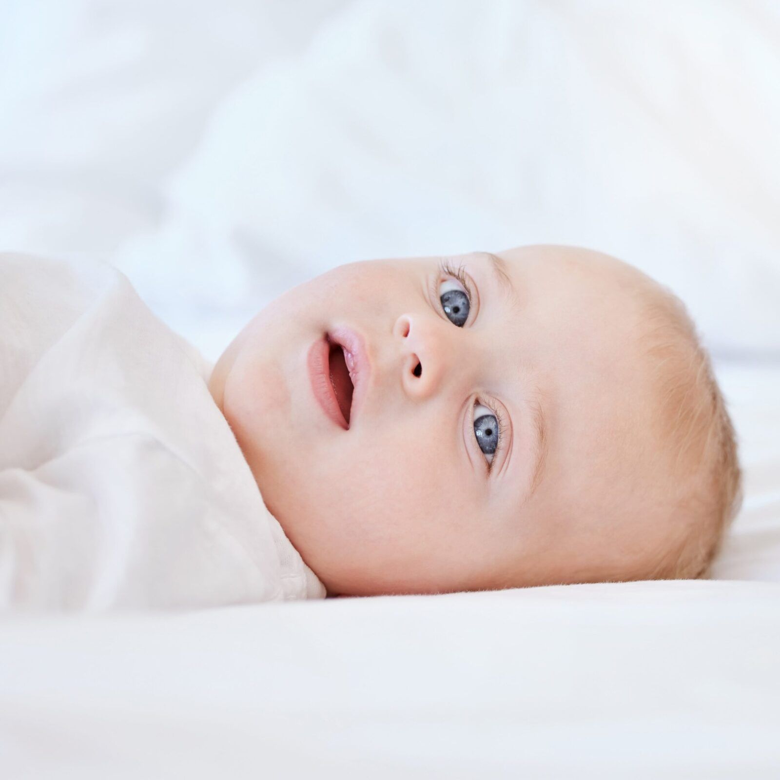 baby on a bed for morning