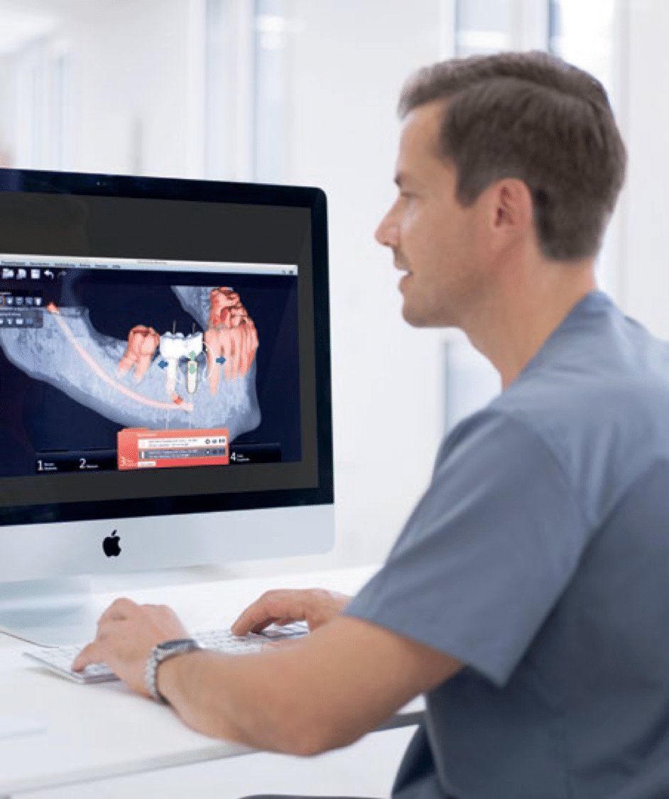 Dentist Using Digital Technology at dental office