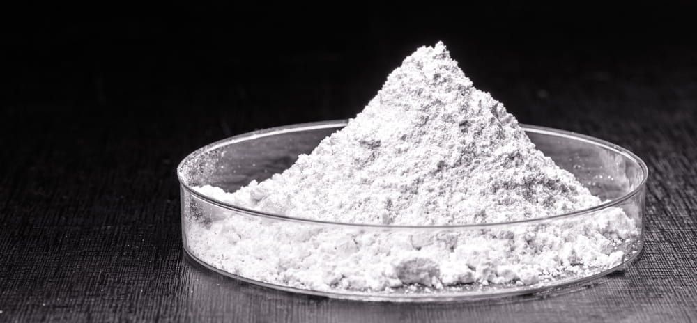 Zirconium Silicate (ZrSiO4), used in opacifiers in ceramic enamels, is a zirconium oxide that contains quartz.
