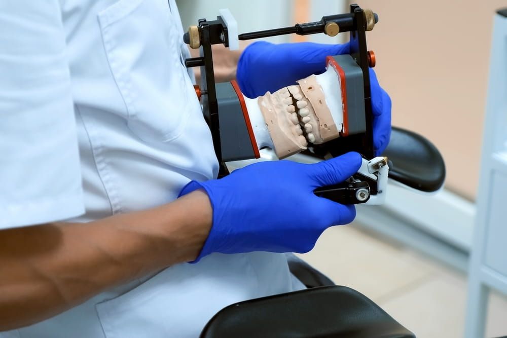 Bite and joint, occlusion correction before installing veneers crowns