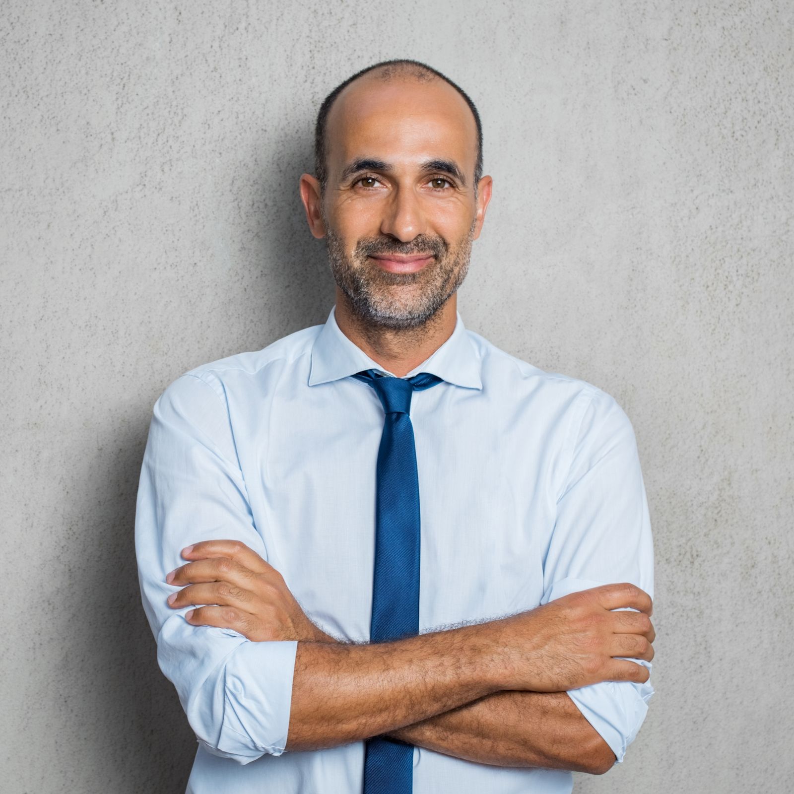 Happy mature man in shirt and tie