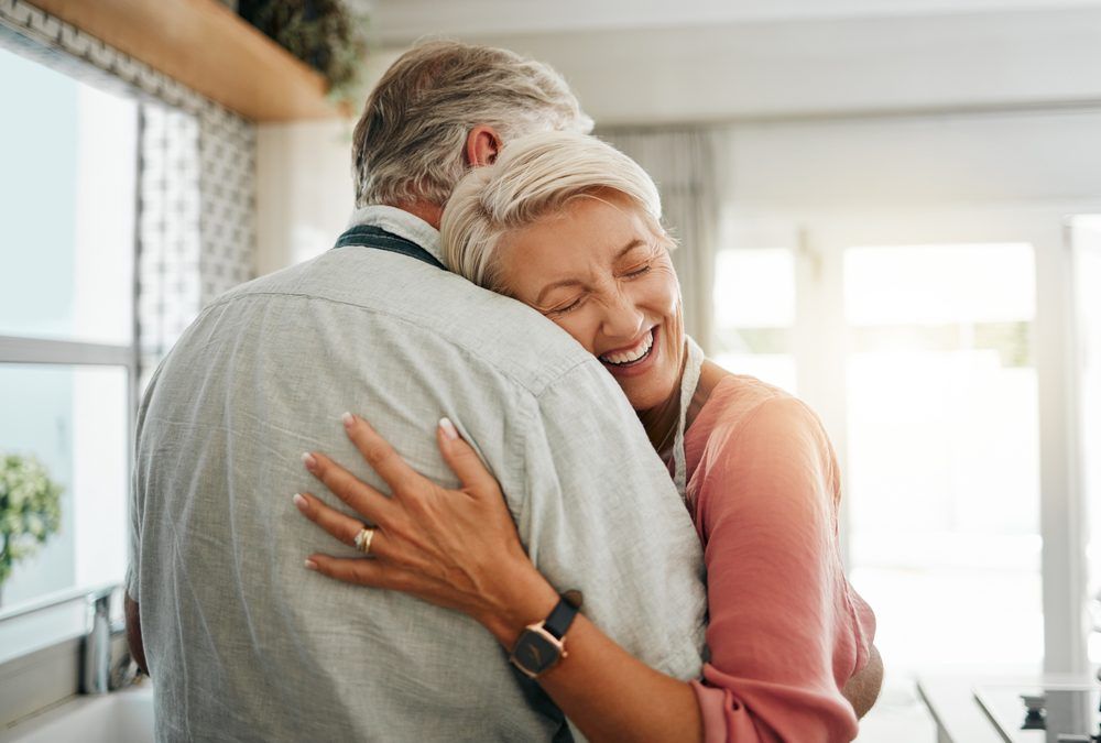 senior couple hugging