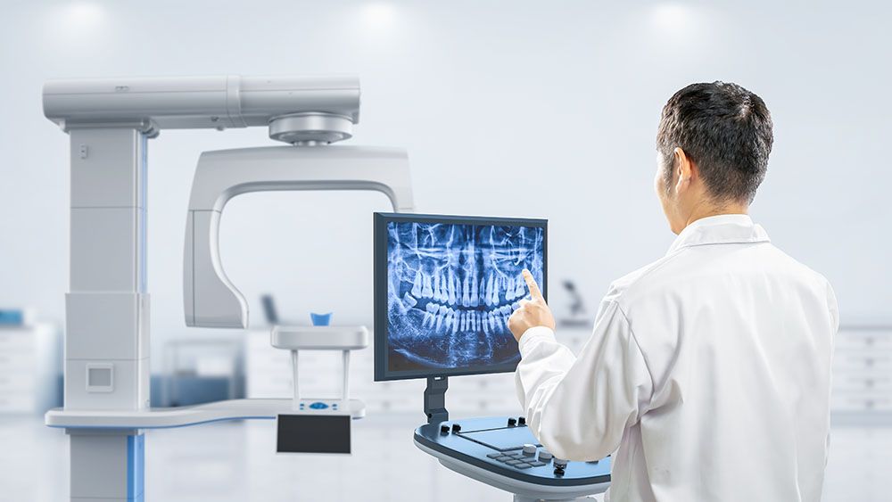 Dentist analyze digital x-ray film from scanner machine in 3d rendering hospital room