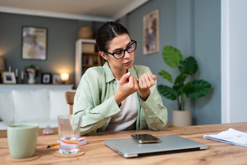 woman with attention difficulty hyperactivity disorder (ADHD) sitting at home