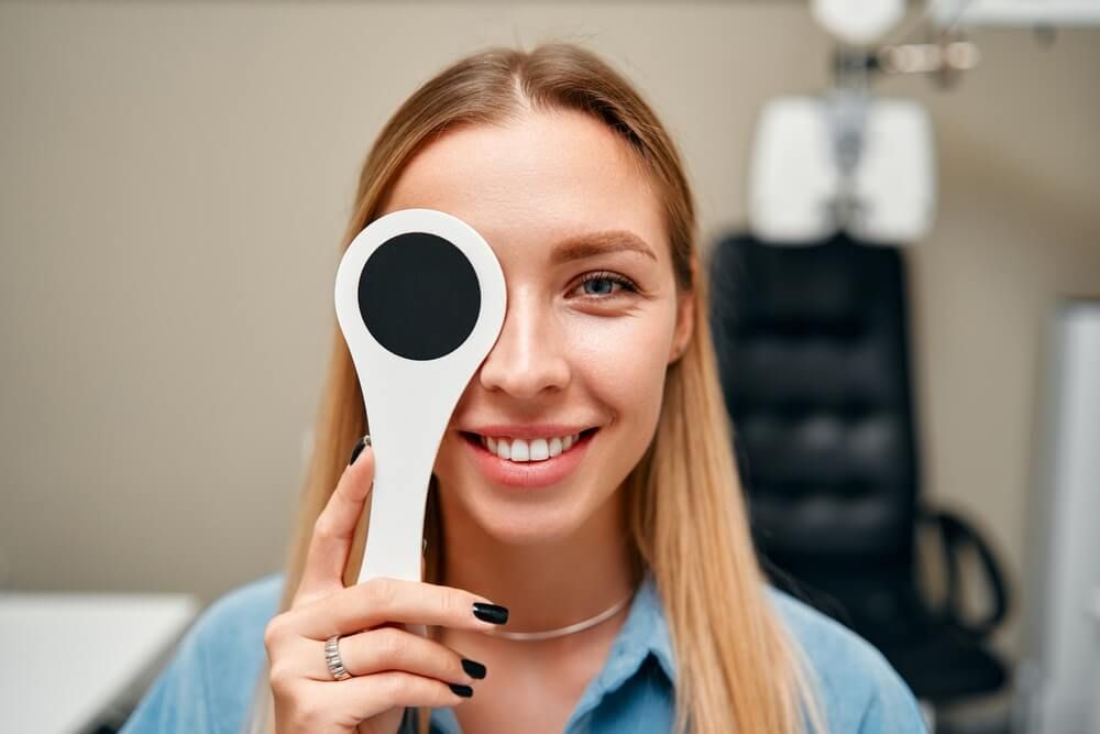 female patient is having her eyesight checked in an ophthalmology clinic