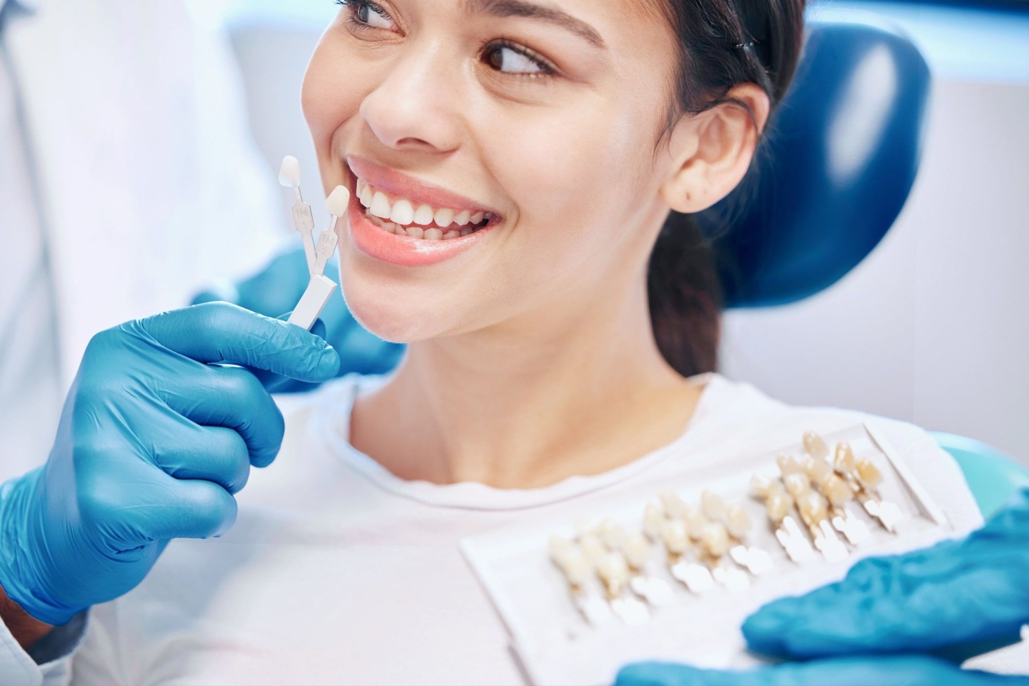 patient and orthodontist with porcelain veneers