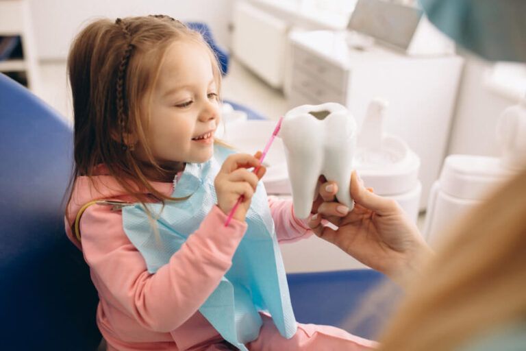 little girl in dental clinic