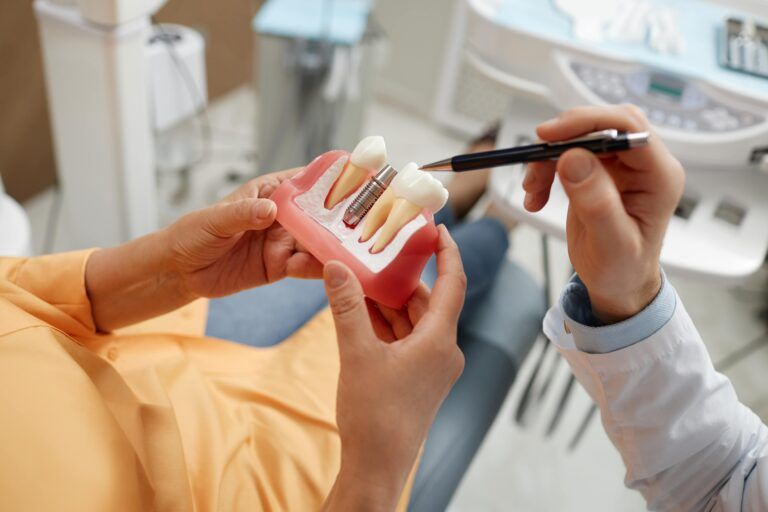 Dentist examining patients in clinic for better dental health